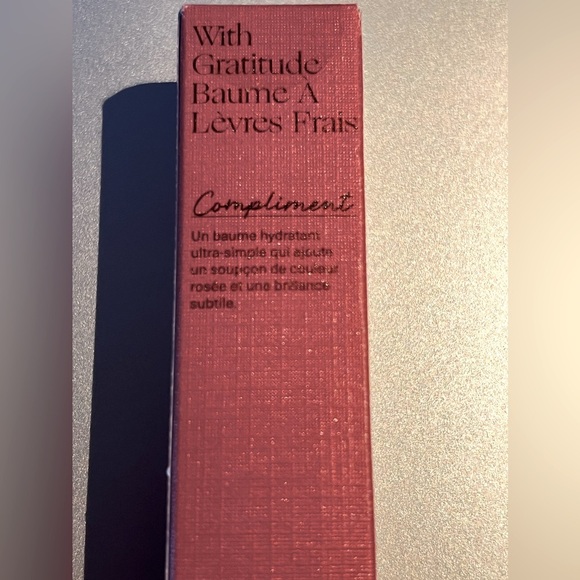 Empathy rose mauve in .10 oz. Gloss with buildable color. - Picture 1 of 5